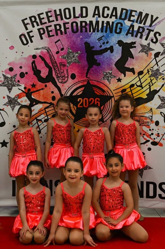 A class in coral sequin costumes