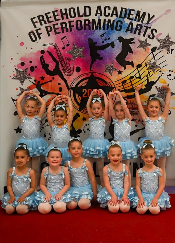 A class in light blue costumes